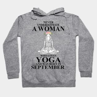 never underestimate a woman who loves yoga and was born in september Hoodie